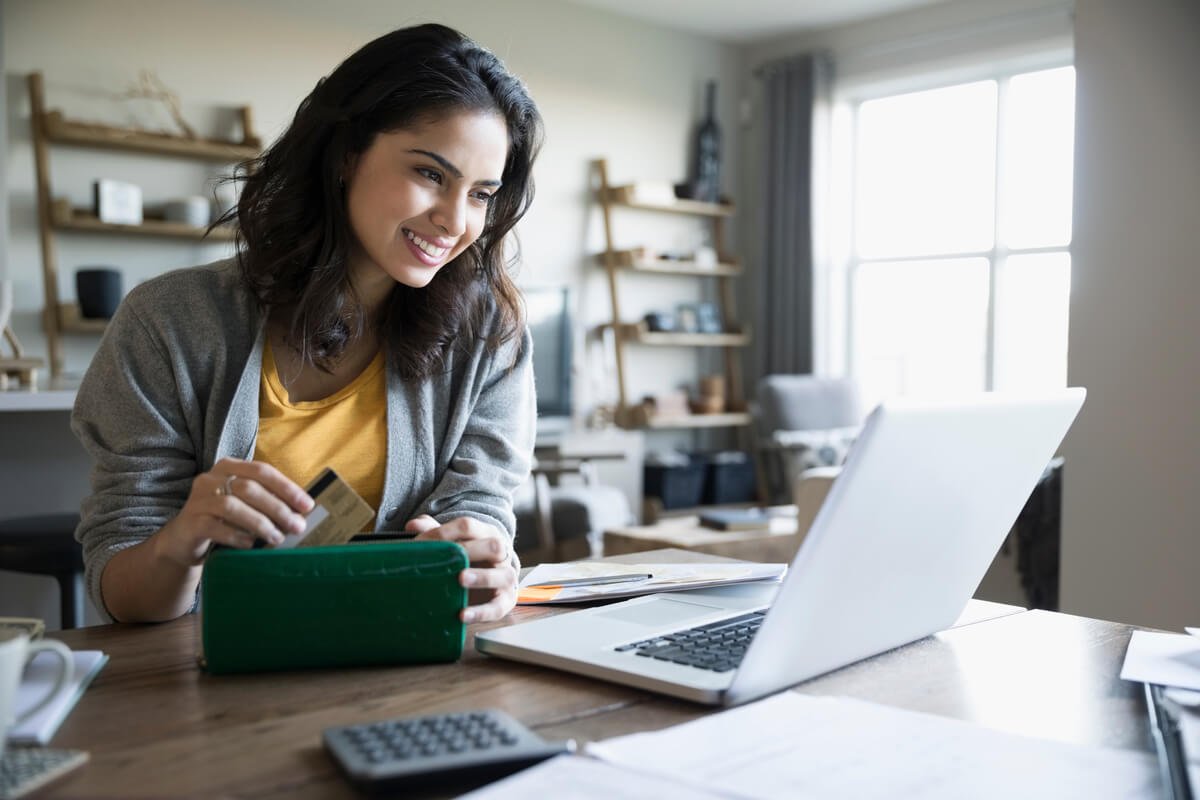 Woman researching the best ways to send money online