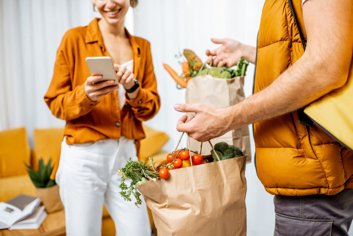 A Gig economy worker delivering groceries