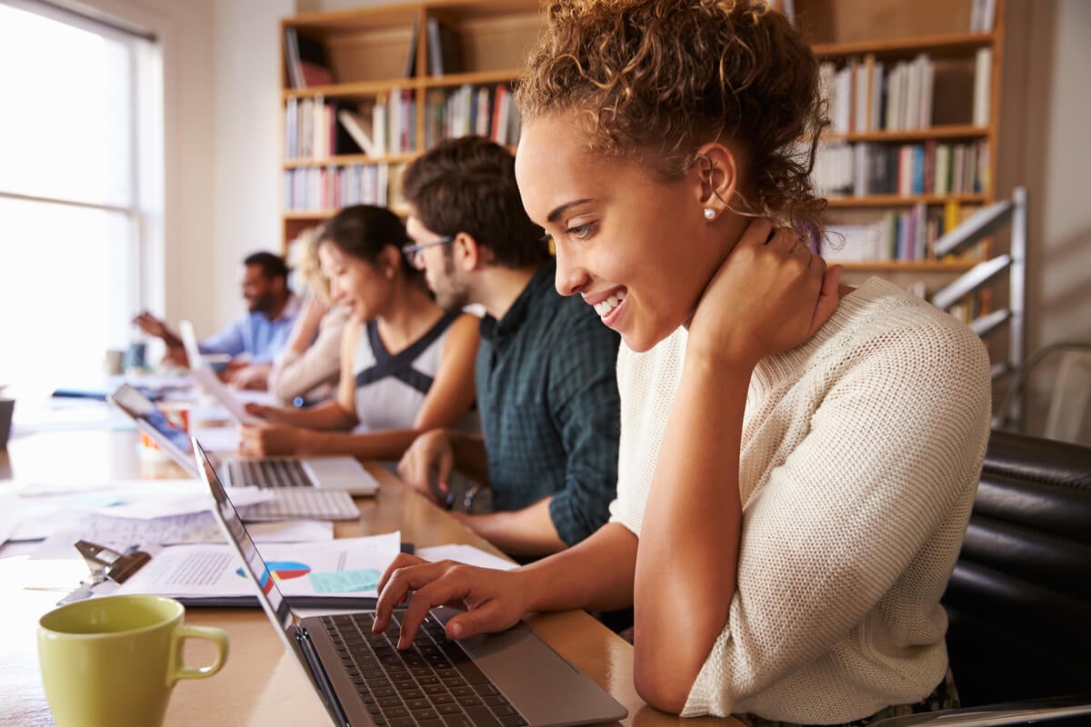 Woman researching ways to improve her credit score